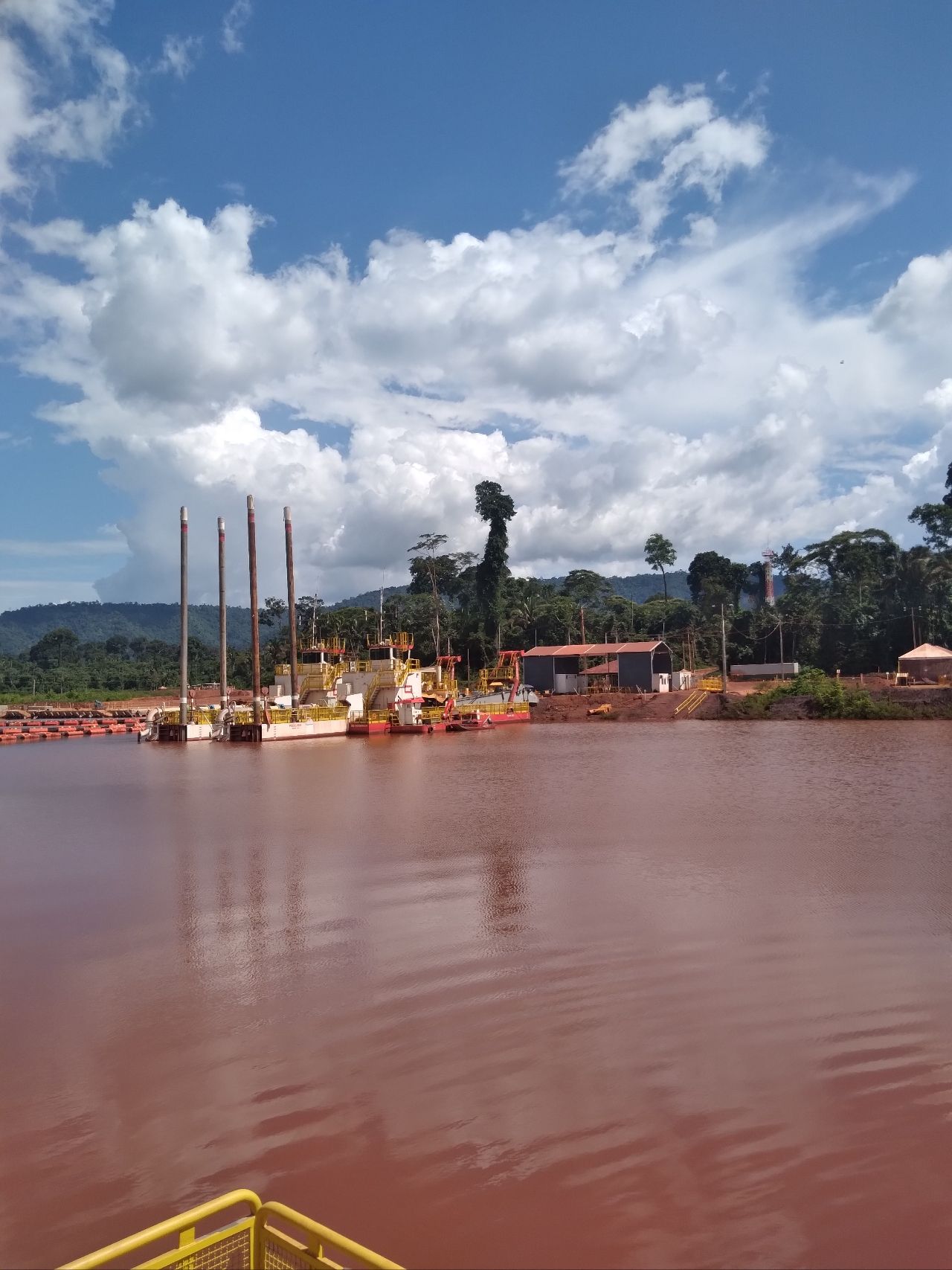 Dredgers in the tailings dam